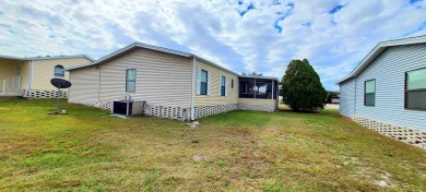 55+/1989/2 BD/2 BA/800 SQ FT/NEW FLOORING/LARGE SCREENED LANAI on Zephyrhills Municipal Golf Course in Florida - for sale on GolfHomes.com, golf home, golf lot