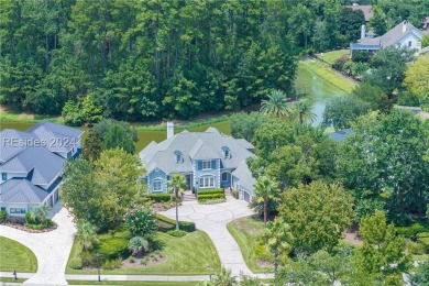 Stunning estate home situated on Eagle Lake in Berkeley Hall on Eagles Pointe Golf Club in South Carolina - for sale on GolfHomes.com, golf home, golf lot