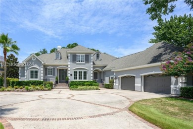 Stunning estate home situated on Eagle Lake in Berkeley Hall on Eagles Pointe Golf Club in South Carolina - for sale on GolfHomes.com, golf home, golf lot