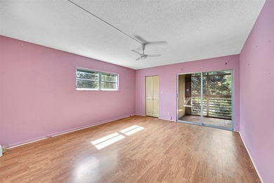 Deluxe Spacious Corner, Screened & Enclosed Balcony with Lake & on Wynmoor Golf Course in Florida - for sale on GolfHomes.com, golf home, golf lot