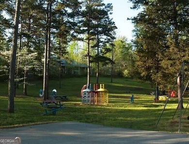 Nestled in the picturesque foothills of the Blue Ridge Mountains on The Trail At Chickasaw Pointe in South Carolina - for sale on GolfHomes.com, golf home, golf lot