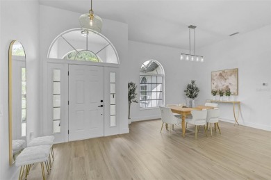Welcome to your dream home in the highly desirable gated Calusa on Calusa Lakes Golf Club in Florida - for sale on GolfHomes.com, golf home, golf lot