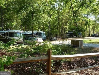 Nestled in the picturesque foothills of the Blue Ridge Mountains on The Trail At Chickasaw Pointe in South Carolina - for sale on GolfHomes.com, golf home, golf lot