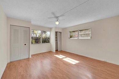 Deluxe Spacious Corner, Screened & Enclosed Balcony with Lake & on Wynmoor Golf Course in Florida - for sale on GolfHomes.com, golf home, golf lot