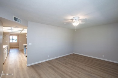 Recently remodeled, Move-in Ready, this charming Lock and Leave on Sunland Village Golf Club in Arizona - for sale on GolfHomes.com, golf home, golf lot