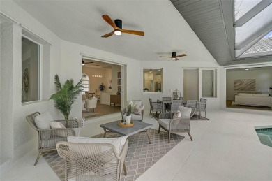 Welcome to your dream home in the highly desirable gated Calusa on Calusa Lakes Golf Club in Florida - for sale on GolfHomes.com, golf home, golf lot