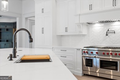 SOPHISTICATED ELEGANCE THROUGHOUT THIS STUNNING NEW CUSTOM on The Governors Towne Club in Georgia - for sale on GolfHomes.com, golf home, golf lot