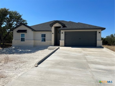 Beautiful NEW home in the desired golf course community of on Vaaler Creek Golf Club in Texas - for sale on GolfHomes.com, golf home, golf lot