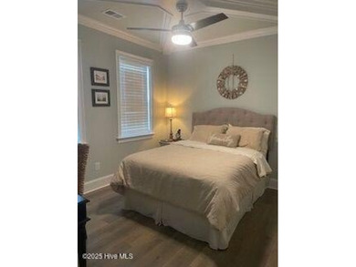 Experience luxury coastal living in this custom 4 bedroom-3 1/2 on Sea Trail Golf Resort in North Carolina - for sale on GolfHomes.com, golf home, golf lot