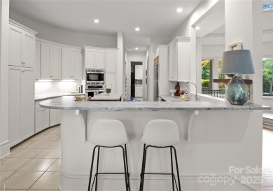 Escape to this sleek 5 bed, 4.5 bath two story contemporary home on Carmel Country Club in North Carolina - for sale on GolfHomes.com, golf home, golf lot