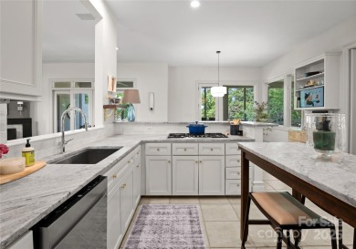 Escape to this sleek 5 bed, 4.5 bath two story contemporary home on Carmel Country Club in North Carolina - for sale on GolfHomes.com, golf home, golf lot