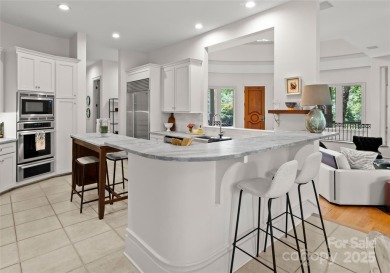 Escape to this sleek 5 bed, 4.5 bath two story contemporary home on Carmel Country Club in North Carolina - for sale on GolfHomes.com, golf home, golf lot