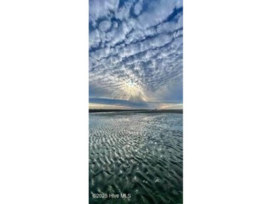 Experience luxury coastal living in this custom 4 bedroom-3 1/2 on Sea Trail Golf Resort in North Carolina - for sale on GolfHomes.com, golf home, golf lot