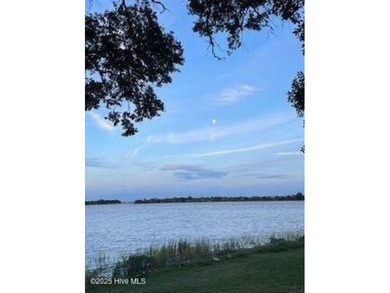 Experience luxury coastal living in this custom 4 bedroom-3 1/2 on Sea Trail Golf Resort in North Carolina - for sale on GolfHomes.com, golf home, golf lot