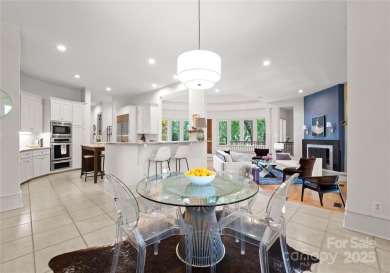 Escape to this sleek 5 bed, 4.5 bath two story contemporary home on Carmel Country Club in North Carolina - for sale on GolfHomes.com, golf home, golf lot