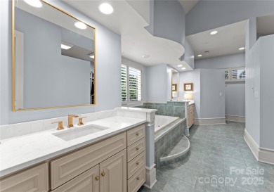 Escape to this sleek 5 bed, 4.5 bath two story contemporary home on Carmel Country Club in North Carolina - for sale on GolfHomes.com, golf home, golf lot