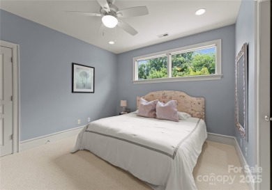 Escape to this sleek 5 bed, 4.5 bath two story contemporary home on Carmel Country Club in North Carolina - for sale on GolfHomes.com, golf home, golf lot