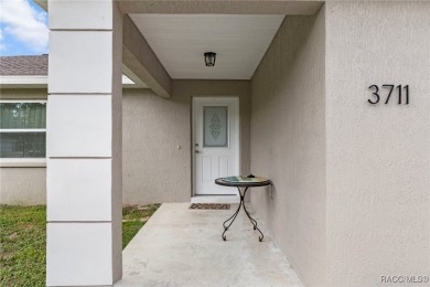 Calling all buy-and-hold investors to this 3-year-old home in on Pine Ridge Community Golf and Country Club in Florida - for sale on GolfHomes.com, golf home, golf lot