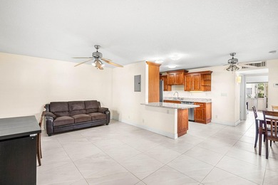 Step into this light-filled 1-bed, 1.5-bath 1st floor corner on Kings Point Golf -Flanders Way in Florida - for sale on GolfHomes.com, golf home, golf lot