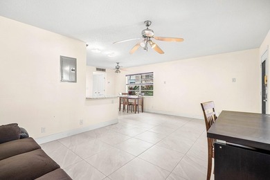 Step into this light-filled 1-bed, 1.5-bath 1st floor corner on Kings Point Golf -Flanders Way in Florida - for sale on GolfHomes.com, golf home, golf lot