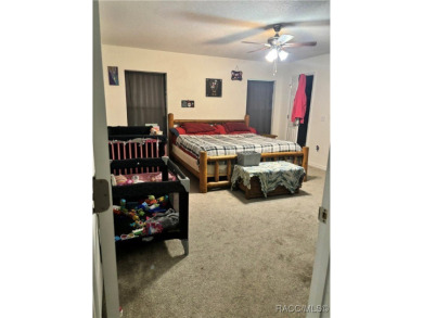 Calling all buy-and-hold investors to this 3-year-old home in on Pine Ridge Community Golf and Country Club in Florida - for sale on GolfHomes.com, golf home, golf lot