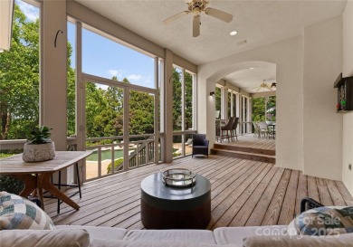 Escape to this sleek 5 bed, 4.5 bath two story contemporary home on Carmel Country Club in North Carolina - for sale on GolfHomes.com, golf home, golf lot