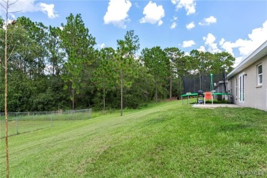 Calling all buy-and-hold investors to this 3-year-old home in on Pine Ridge Community Golf and Country Club in Florida - for sale on GolfHomes.com, golf home, golf lot