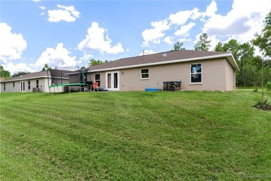 Calling all buy-and-hold investors to this 3-year-old home in on Pine Ridge Community Golf and Country Club in Florida - for sale on GolfHomes.com, golf home, golf lot