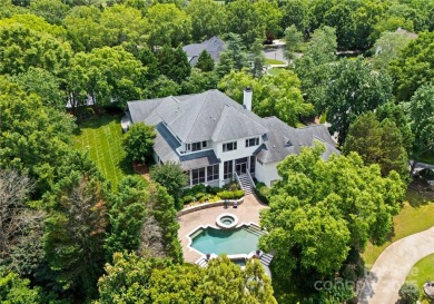 Escape to this sleek 5 bed, 4.5 bath two story contemporary home on Carmel Country Club in North Carolina - for sale on GolfHomes.com, golf home, golf lot