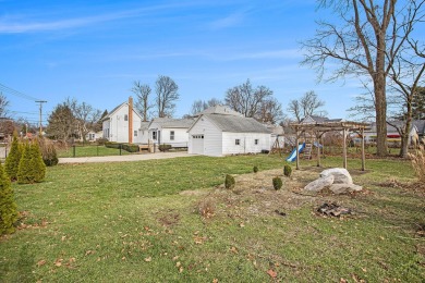 Welcome to 737 W Green St., Marshall--a charming two-story on Alwyn Downs Golf Club in Michigan - for sale on GolfHomes.com, golf home, golf lot