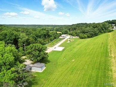 This is it! An incredible opportunity to own a waterfront lot on on Raintree Country Club in Missouri - for sale on GolfHomes.com, golf home, golf lot