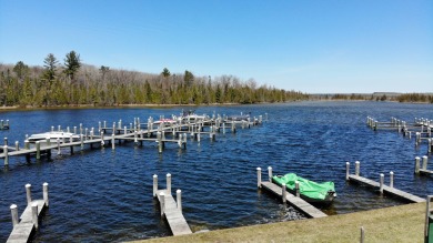 This beautiful wooded building site in one of Indian River's on Indian River Golf Club in Michigan - for sale on GolfHomes.com, golf home, golf lot