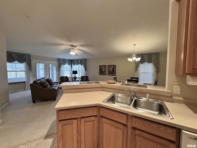 This duplex is located on fairway 15 at the Macomb Country Club on Macomb Country Club in Illinois - for sale on GolfHomes.com, golf home, golf lot