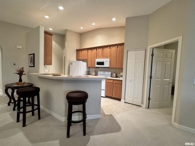 This duplex is located on fairway 15 at the Macomb Country Club on Macomb Country Club in Illinois - for sale on GolfHomes.com, golf home, golf lot