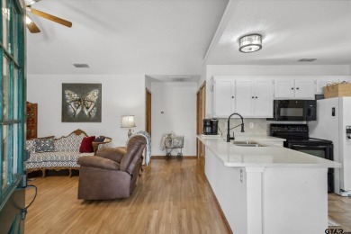 Beautifully maintained home in gated community. The cute covered on Holly Lake Ranch Golf Club in Texas - for sale on GolfHomes.com, golf home, golf lot