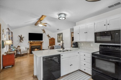 Beautifully maintained home in gated community. The cute covered on Holly Lake Ranch Golf Club in Texas - for sale on GolfHomes.com, golf home, golf lot