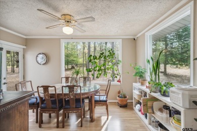 Beautifully maintained home in gated community. The cute covered on Holly Lake Ranch Golf Club in Texas - for sale on GolfHomes.com, golf home, golf lot