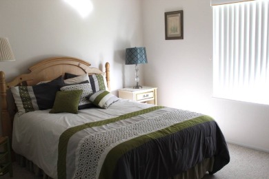 Enter the elegance of this beautifully manicured large 2-bedroom on Schalamar Creek Golf and Country Club in Florida - for sale on GolfHomes.com, golf home, golf lot