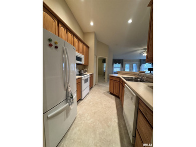 This duplex is located on fairway 15 at the Macomb Country Club on Macomb Country Club in Illinois - for sale on GolfHomes.com, golf home, golf lot