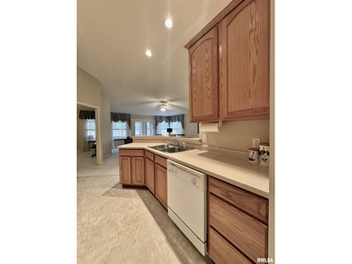 This duplex is located on fairway 15 at the Macomb Country Club on Macomb Country Club in Illinois - for sale on GolfHomes.com, golf home, golf lot