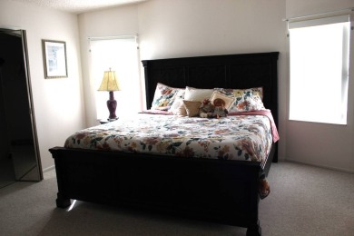 Enter the elegance of this beautifully manicured large 2-bedroom on Schalamar Creek Golf and Country Club in Florida - for sale on GolfHomes.com, golf home, golf lot