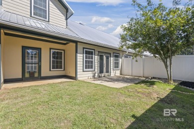 This 3 bed 2.5 bath property is coastal living at its finest and on The Golf Club of the Wharf in Alabama - for sale on GolfHomes.com, golf home, golf lot