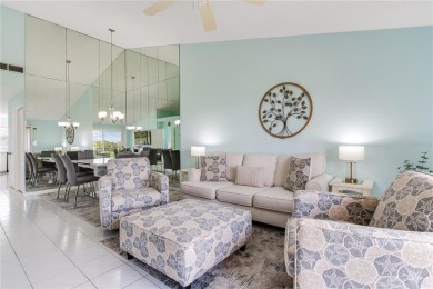 Golf Course Views in Isla Del Sol - Island Living at Its Finest! on Isla Del Sol Yacht and Country Club in Florida - for sale on GolfHomes.com, golf home, golf lot