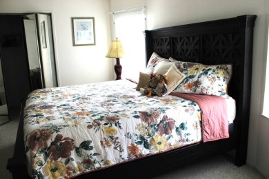 Enter the elegance of this beautifully manicured large 2-bedroom on Schalamar Creek Golf and Country Club in Florida - for sale on GolfHomes.com, golf home, golf lot