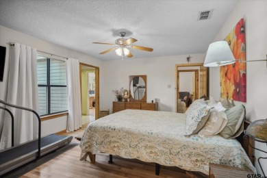Beautifully maintained home in gated community. The cute covered on Holly Lake Ranch Golf Club in Texas - for sale on GolfHomes.com, golf home, golf lot