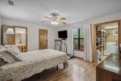 Beautifully maintained home in gated community. The cute covered on Holly Lake Ranch Golf Club in Texas - for sale on GolfHomes.com, golf home, golf lot