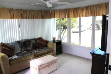 Enter the elegance of this beautifully manicured large 2-bedroom on Schalamar Creek Golf and Country Club in Florida - for sale on GolfHomes.com, golf home, golf lot