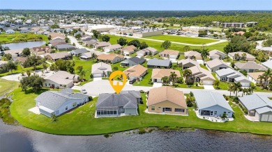 SENSATIONAL WATER VIEW from a MASSIVE enclosed and tiled lanai on Kings Gate Golf Club in Florida - for sale on GolfHomes.com, golf home, golf lot