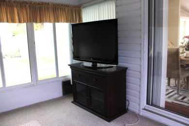 Enter the elegance of this beautifully manicured large 2-bedroom on Schalamar Creek Golf and Country Club in Florida - for sale on GolfHomes.com, golf home, golf lot