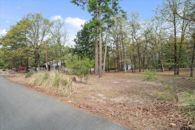 Beautifully maintained home in gated community. The cute covered on Holly Lake Ranch Golf Club in Texas - for sale on GolfHomes.com, golf home, golf lot